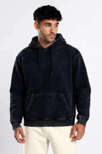 Example product photo: a black acid-wash hoodie